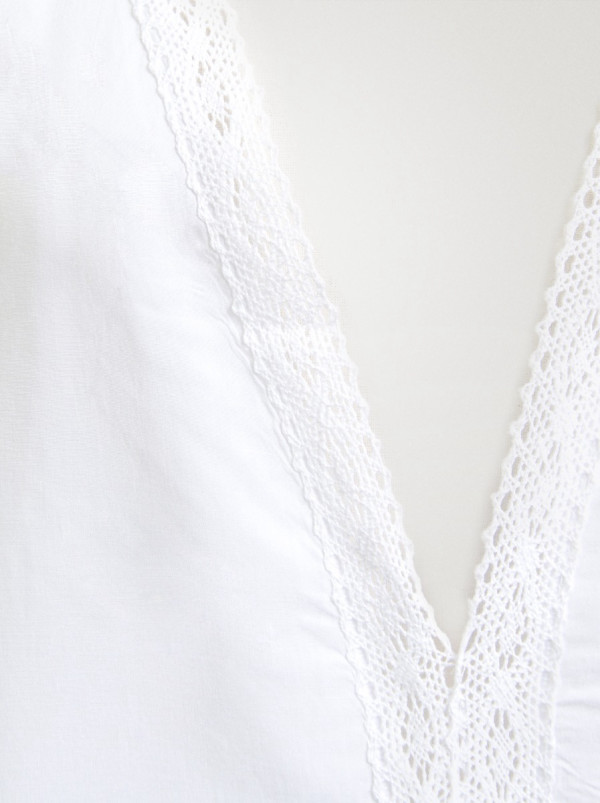 Lightweight white summer tunic