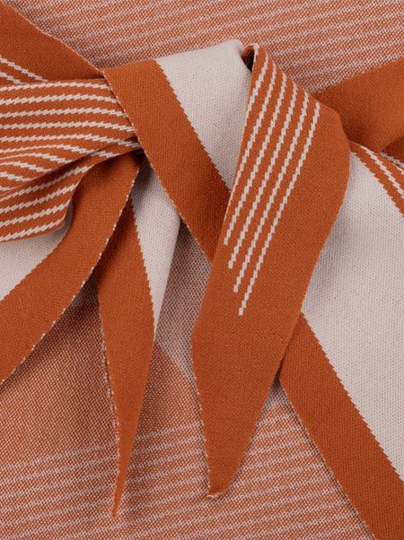 Rhombus-shaped scarf with geometric patterns
